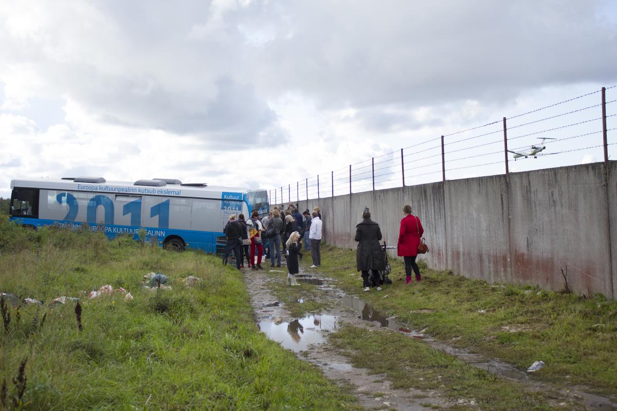 Bus tour from the city got stuck in the muddy roads.